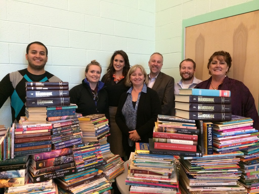 Communication Department Faculty with textbooks