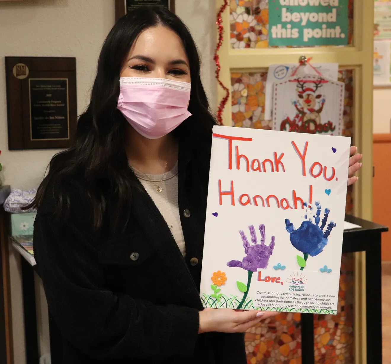 Graduate Hannah Martinez at Book Drive Donation